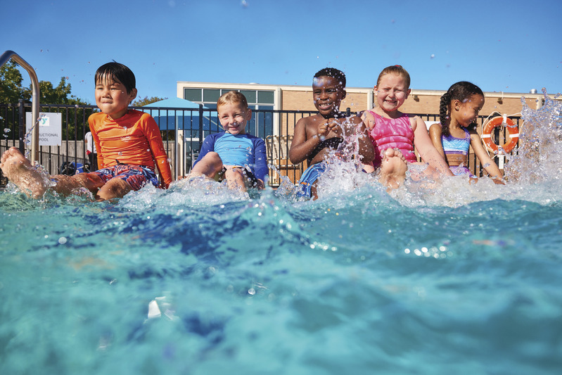 children playing together in pool