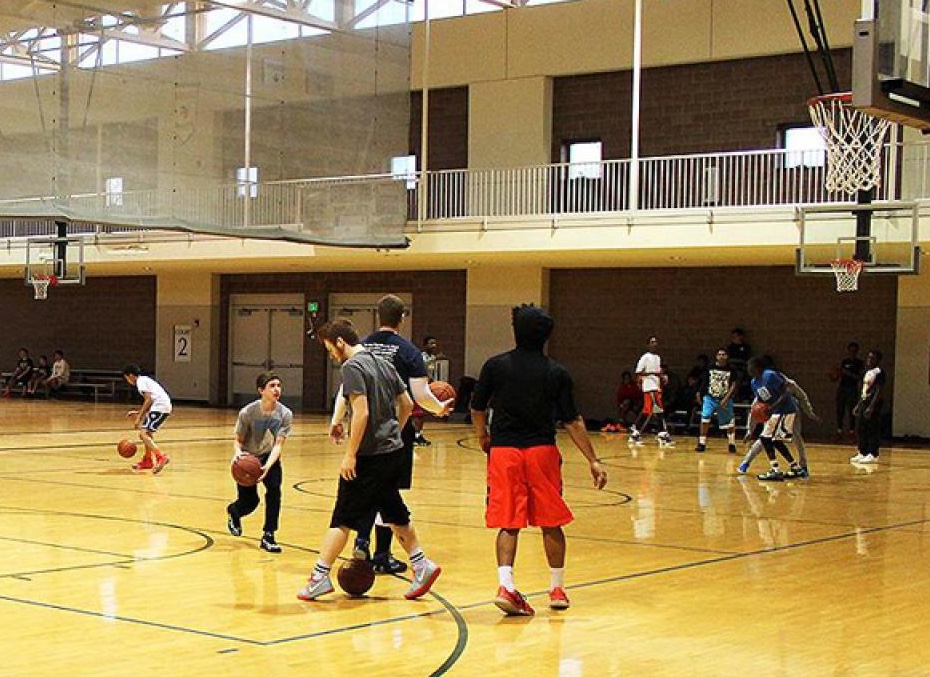 Teens play basketball at the North Kansas City YMCA