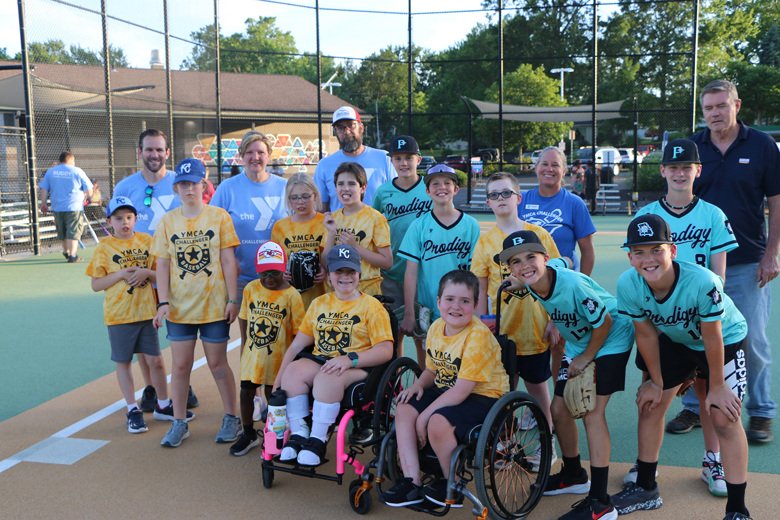 YMCA Challenger Baseball players smiling at the camera for a team photo.