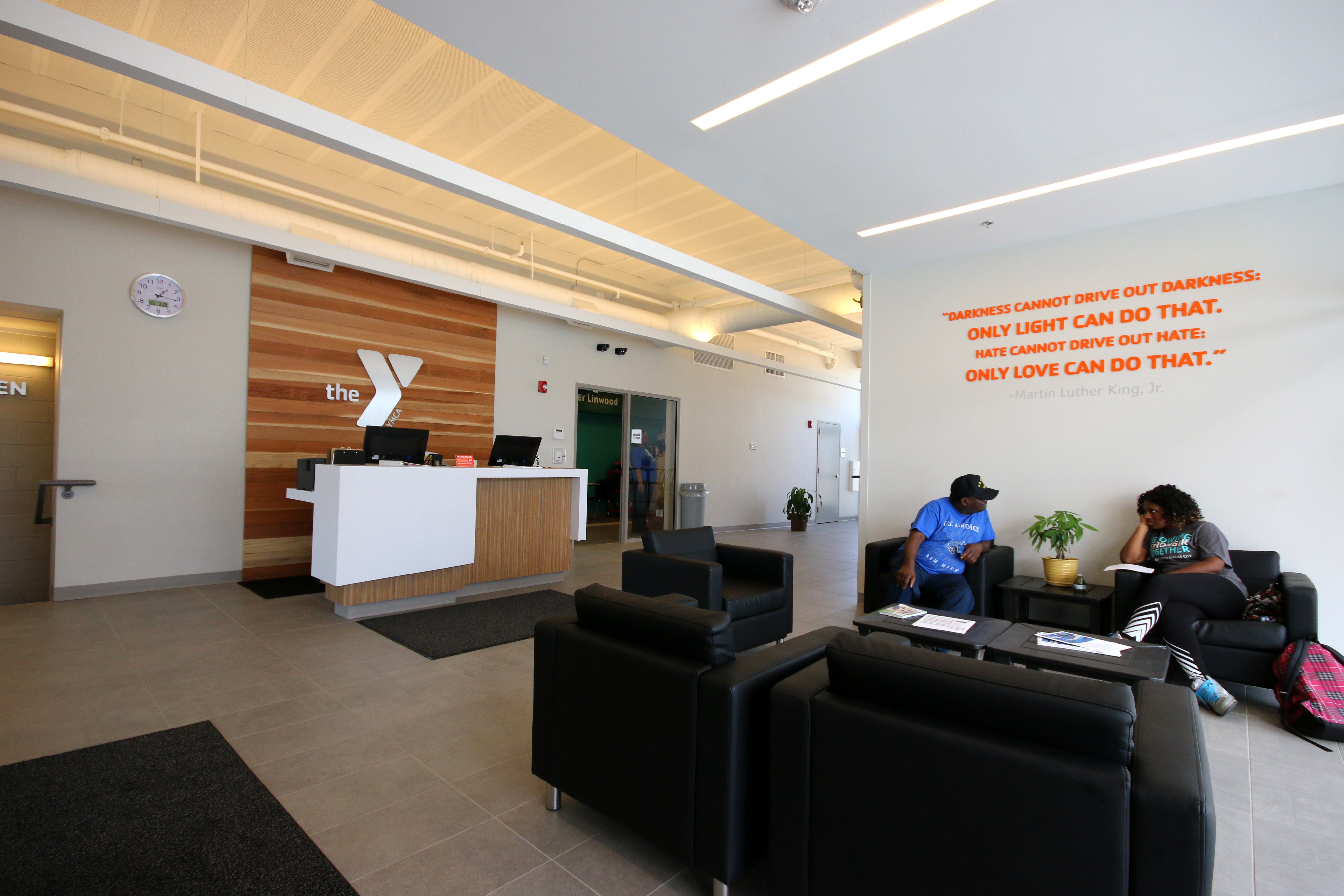 Photo of lobby of Linwood Y, showing seating area for members and welcome center desk