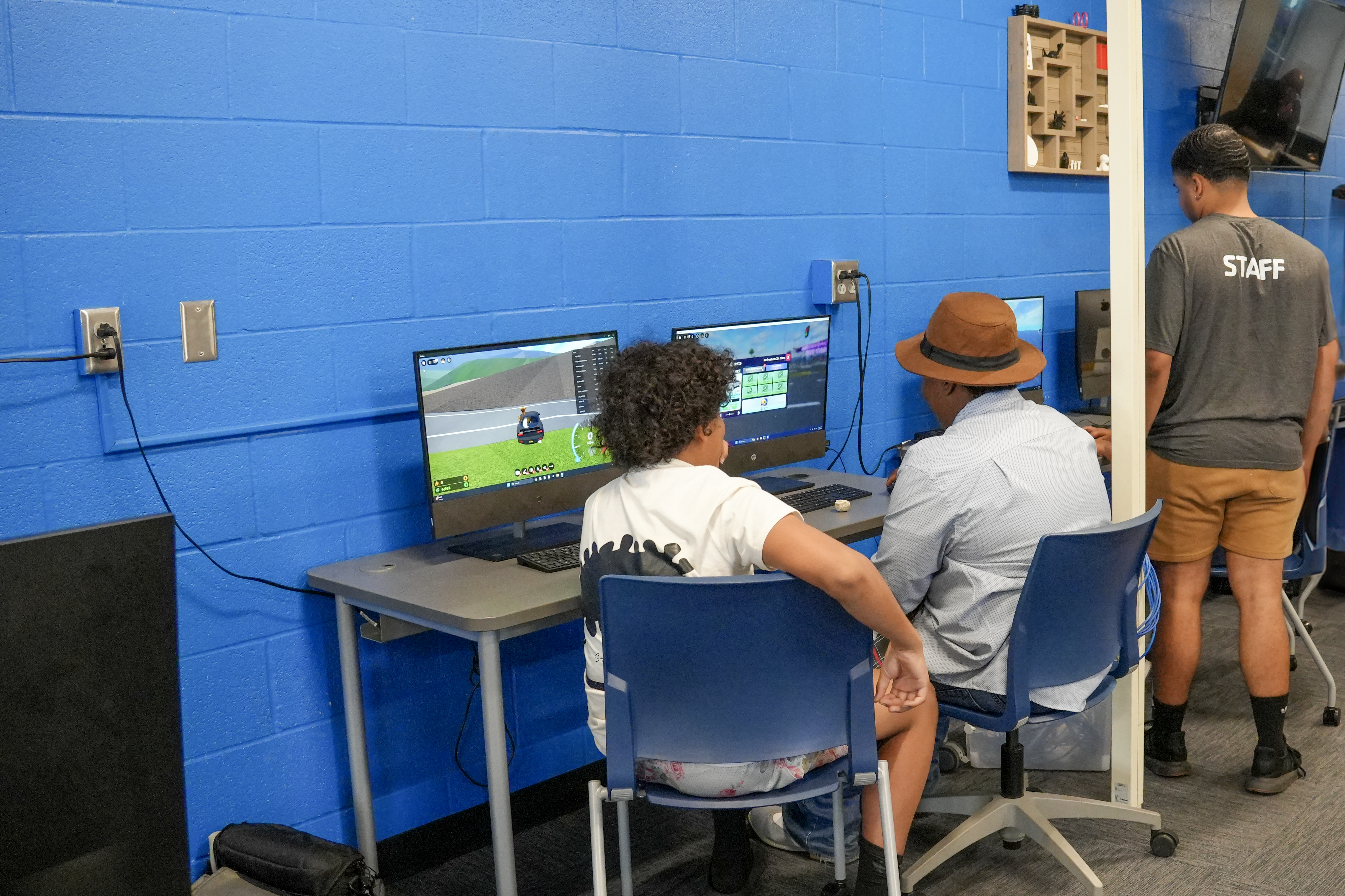 Photo of teens playing on computers at the Best Buy Teen Tech Center