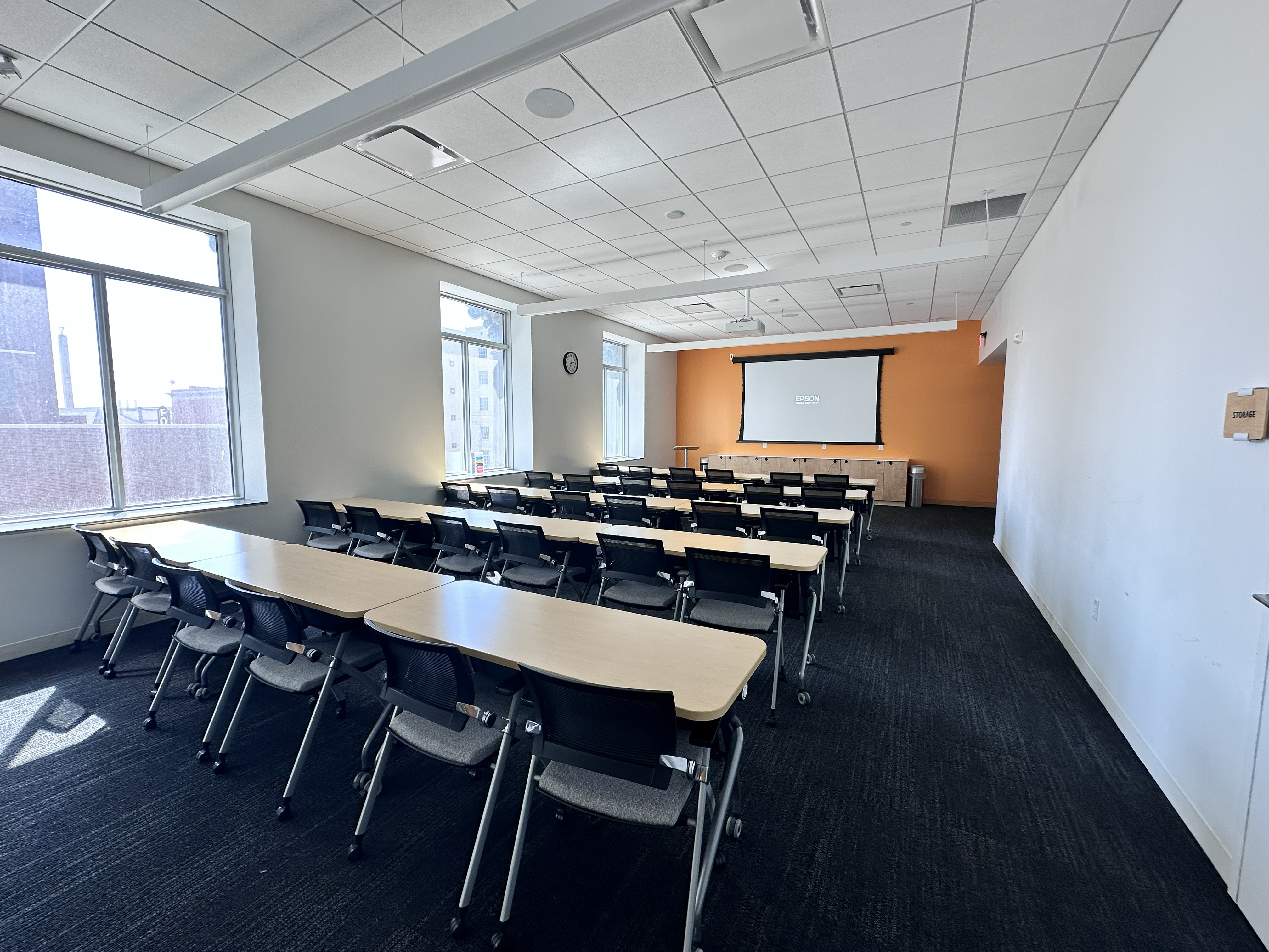 Photo of Respect Conference Room with tables and chairs.