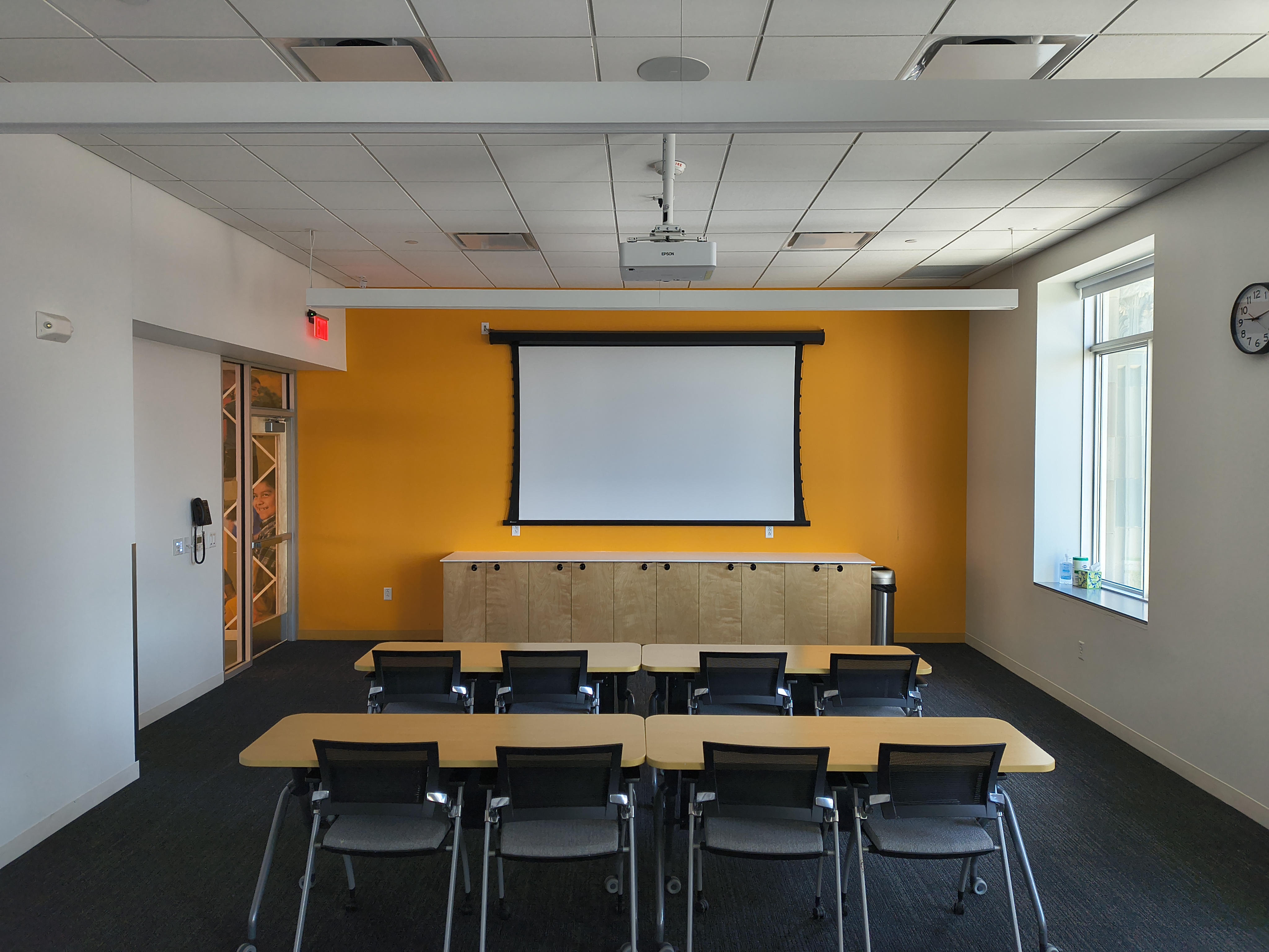 Photo of Responsibility Conference Room with tables and chairs.