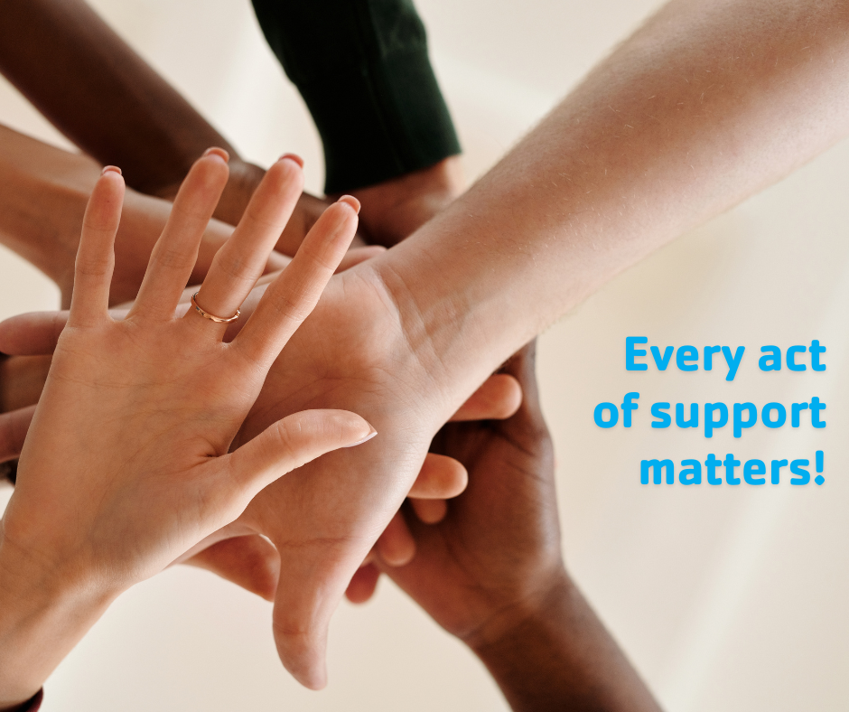 Every act of support matters!Multi-ethnic group of people stacking their hands together