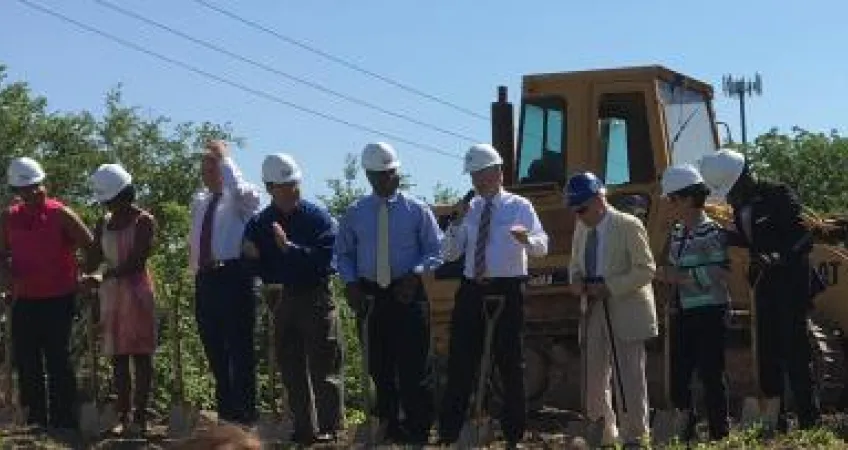 Leaders from the Y and Truman Medical Center break ground together at the new clinic site. 