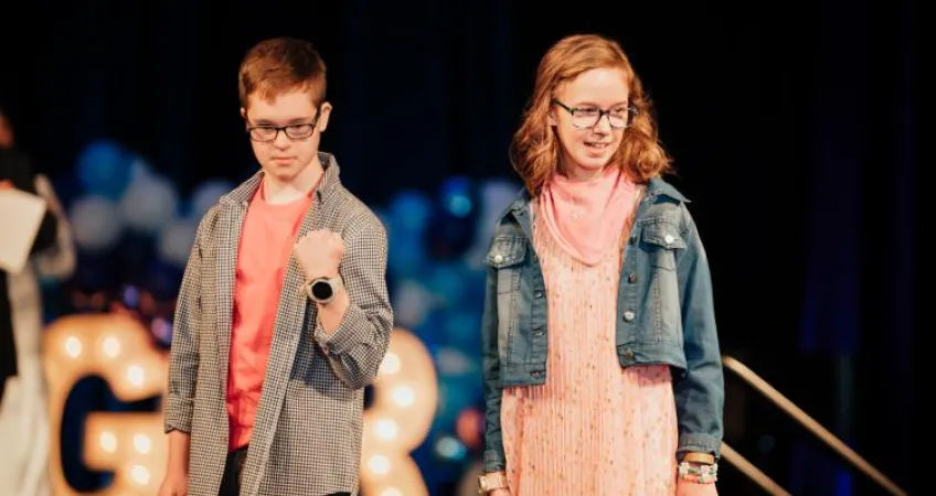 Challenger Models Alexis and Cole walk the runway