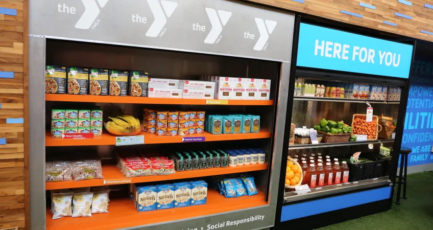 North Kansas City YMCA food pantry stocked with healthy crackers, nuts and fresh fruits.