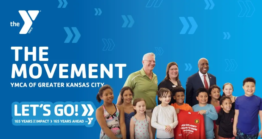 Blue background with The Movement, YMCA of Greater Kansas City, Let's Go, 165 years of impact, 165 years ahead text. Photo of CEO Mark Hulet, with Kansas City, MO Mayor Quenton Lucas, and Aquatic Director Sabrah Parsons posing with  10 children after a water safety class. White YMCA logo at the top left corner.