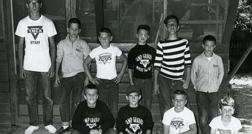 Group photo of campers and staff member at Camp Gravois in 1961