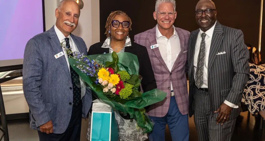 Photo of Allen Blair, YMCA Foundation President; Andrea Ellis, Kauffman Foundation; Mark Hulet, Y President and CEO; Bob Kendrick, Negro Leagues Baseball Museum President and Keynote Speaker