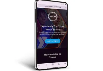 Cell phone with the YMCA360 app displaying