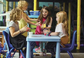 Girls play together at Kids Night Out