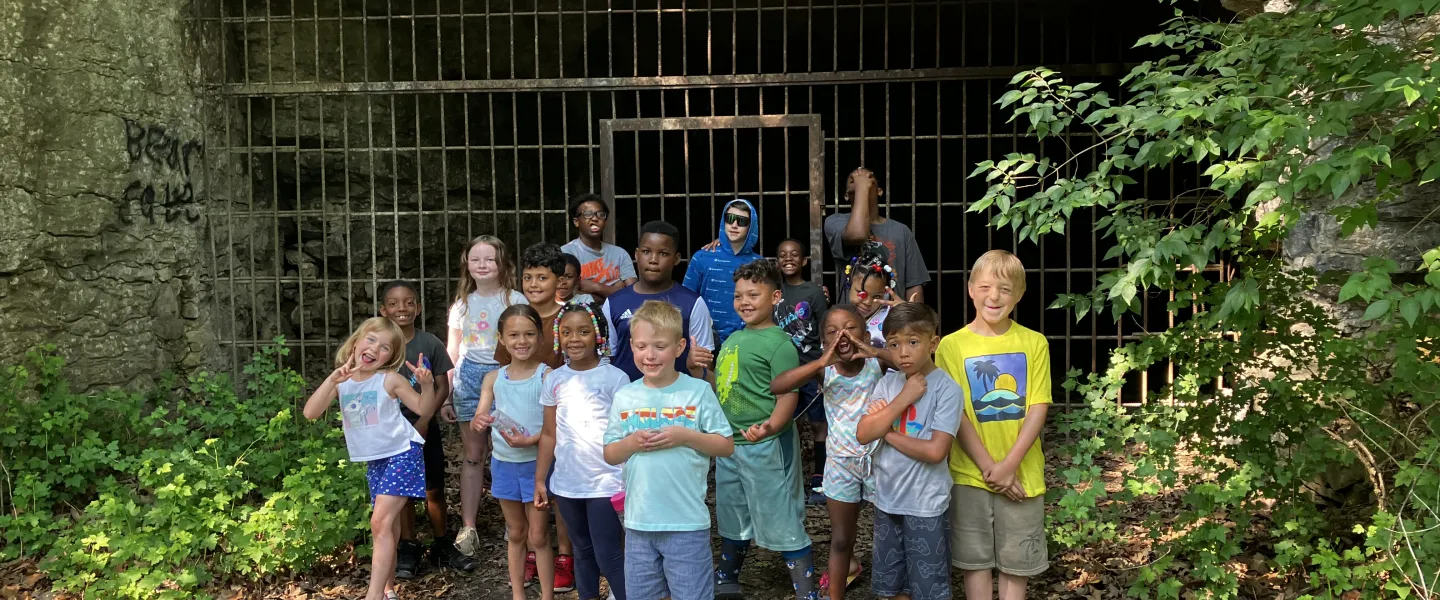 Group of campers at cave during a field trip