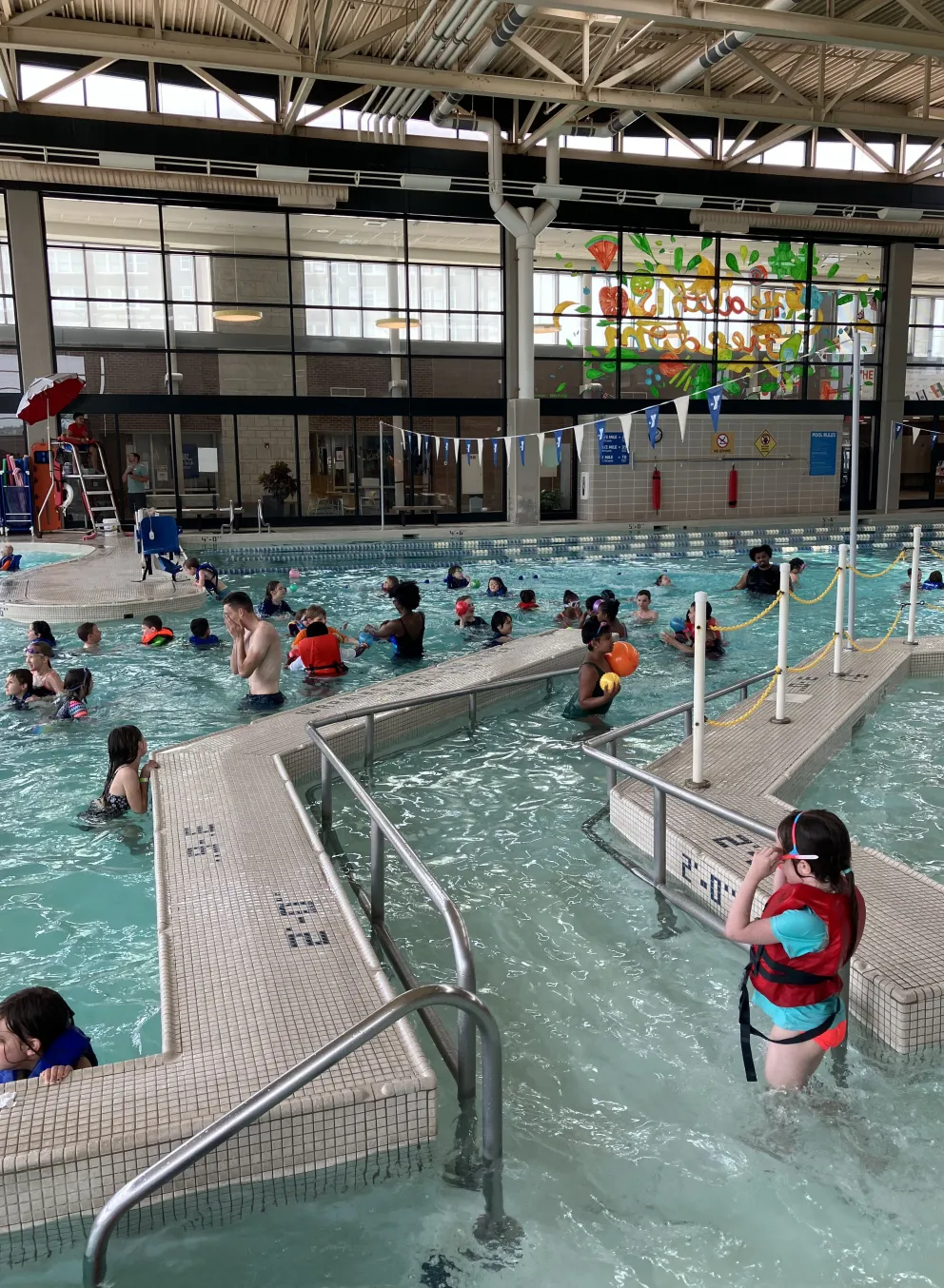 Campers enjoy a weekly field trip swimming at the North Kansas City YMCA.