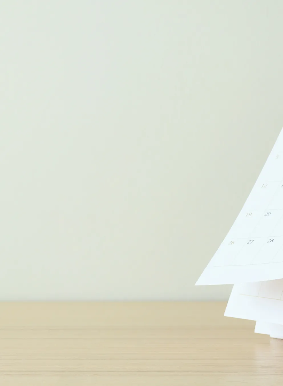Photo of a calendar on a desk.
