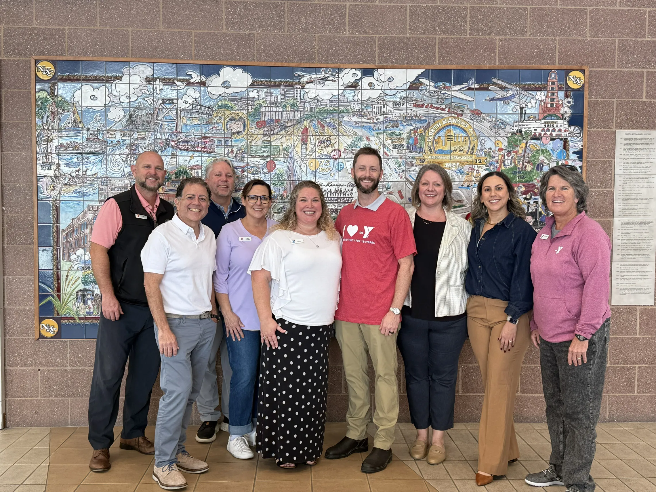 Group photo of North Kansas City YMCA executive director Andrea Toney, North Kansas City Mayor Jesse Smith, and YMCA and UnitedHealthcare representatives