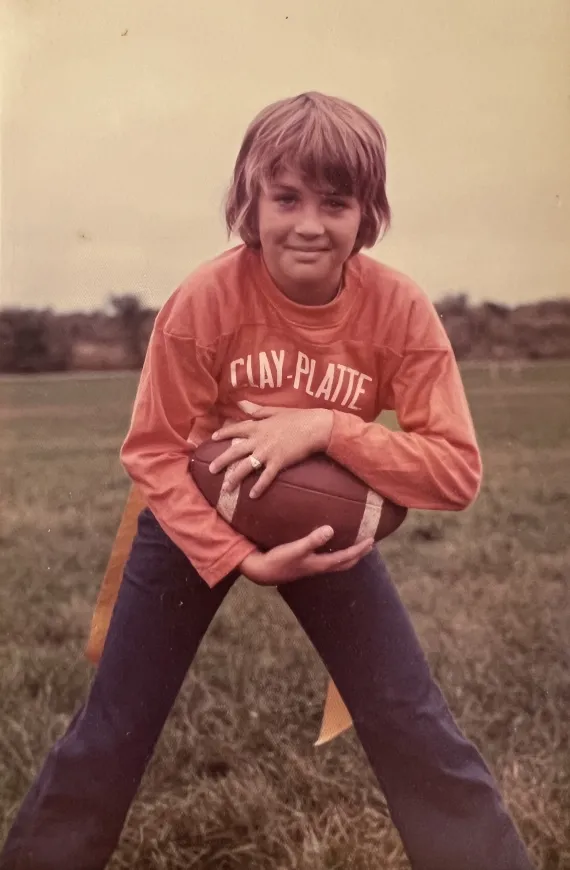 Childhood photo of Greg Westbrook from the Clay-Platte YMCA football program