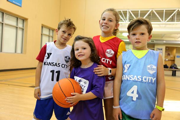 Children playing basketball at the YMCA