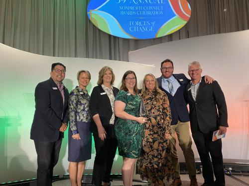Photo of Leo Prieto, Amy Jewell, Lisa Adams, Sabrah Parsons, Jessica Earnshaw, Steve Scraggs and Mark Hulet at the Nonprofit Connect Awards Luncheon
