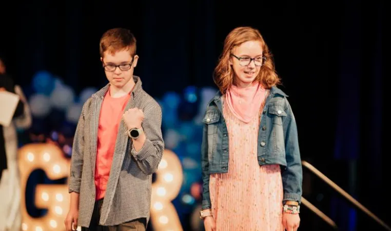 Challenger Models Alexis and Cole walk the runway