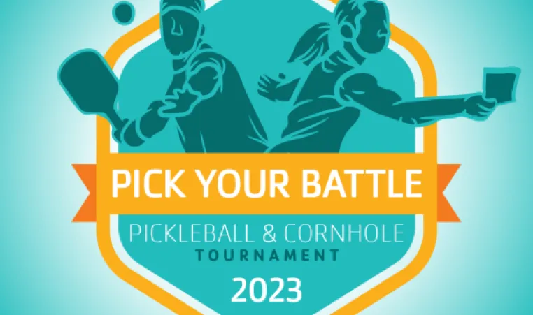 Two illustrated people are side by side, one is playing pickleball and one is playing cornhole. Text says "Pick Your Battle Pickleball and Cornhole Tournament 2023.