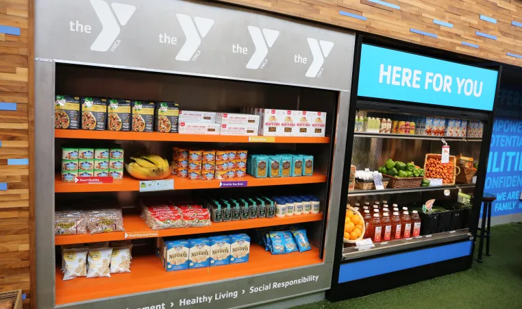 North Kansas City YMCA food pantry stocked with healthy crackers, nuts and fresh fruits.