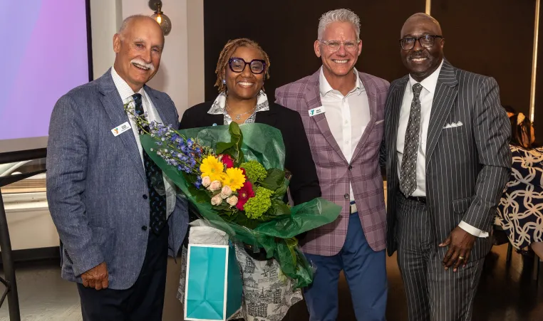 Photo of Allen Blair, YMCA Foundation President; Andrea Ellis, Kauffman Foundation; Mark Hulet, Y President and CEO; Bob Kendrick, Negro Leagues Baseball Museum President and Keynote Speaker