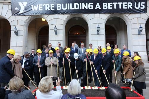 Photo: Donors, partners and leaders turn shovels in a ceremonial groundbreaking for the Downtown YMCA