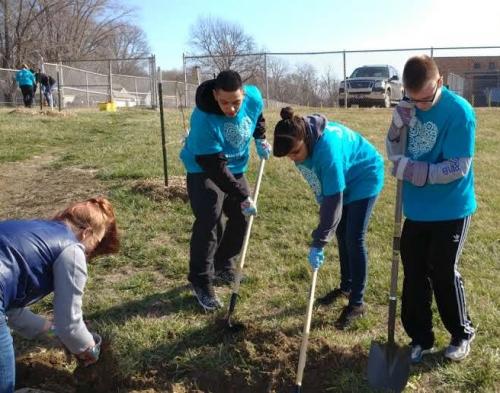 Youth prepare community garden for planting season 